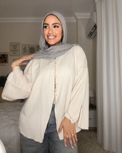 بلوزة كرينكل بأزرار بيج