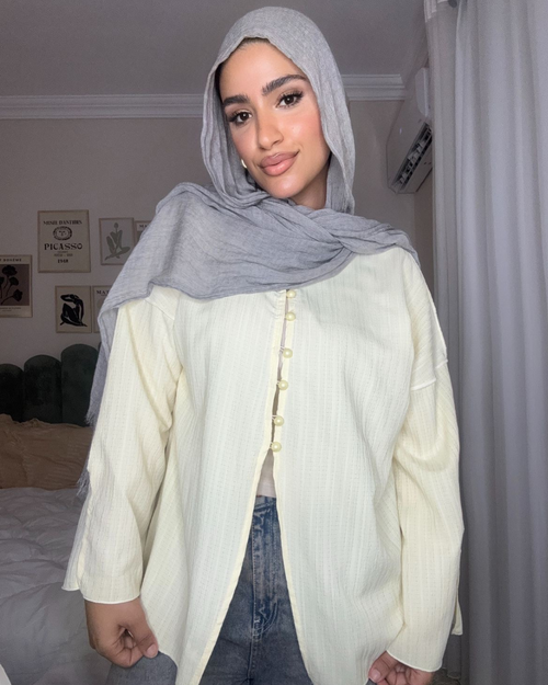 بلوزة كرينكل بأزرار أصفر