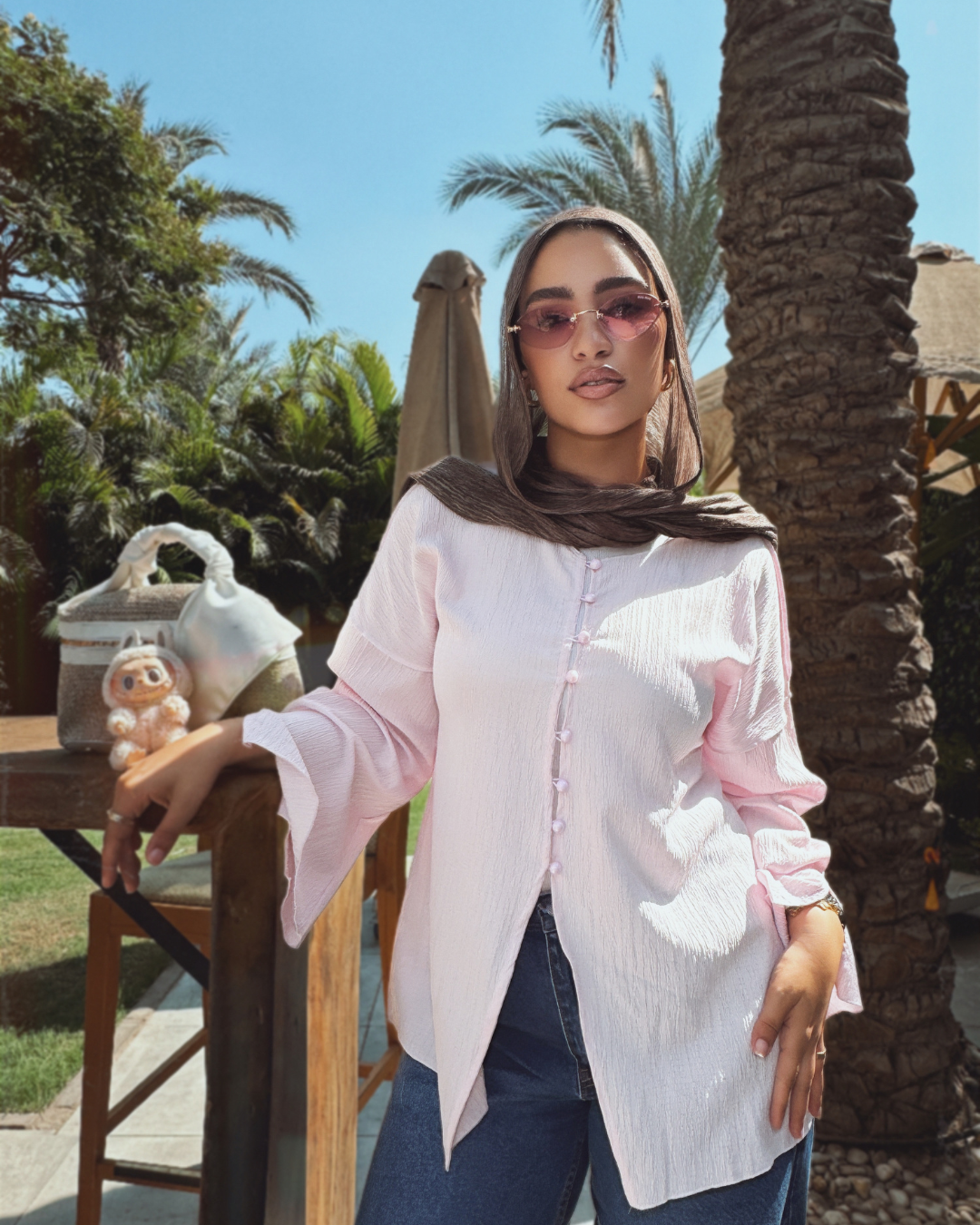 بلوزة كرينكل بأزرار بينك