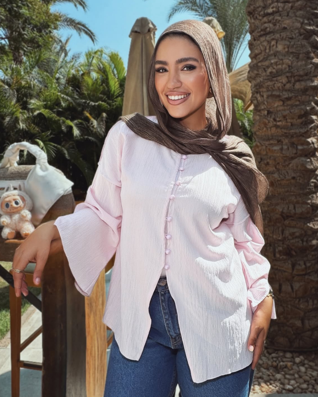 بلوزة كرينكل بأزرار بينك